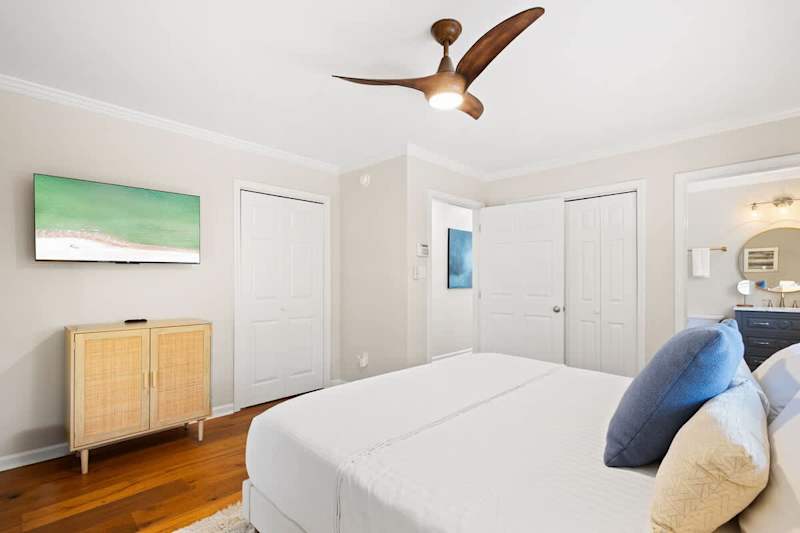 Bedroom features a smart tv.