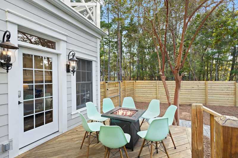 Back deck features a gas firepit.