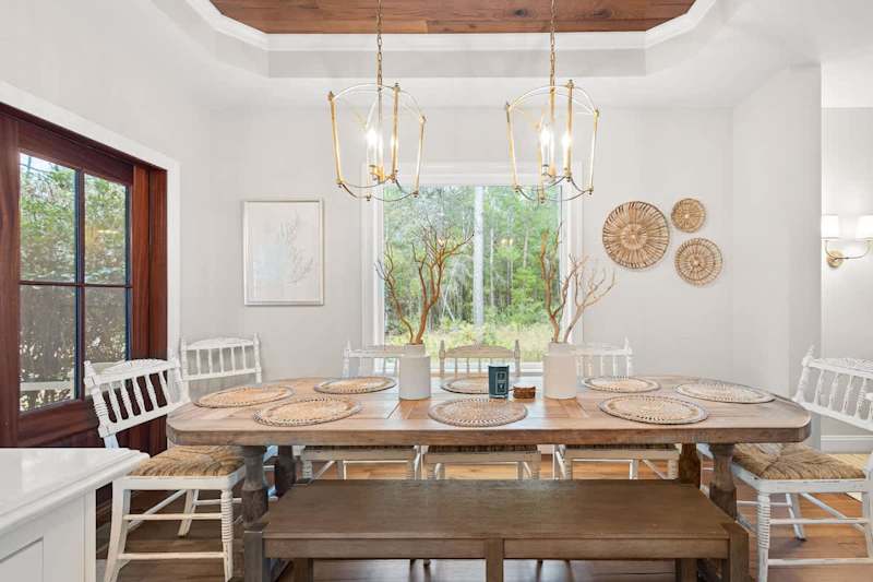 Dining room table includes seating for 8.