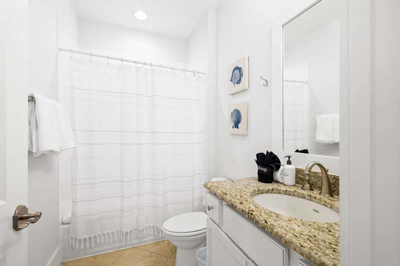 Second floor full bathroom features a shower/tub combo.