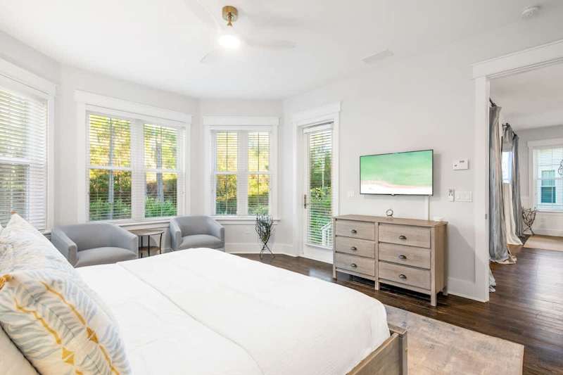Bedroom #1 features a king bed, smart tv and ensuite. Bedroom features a walkout to back patio.