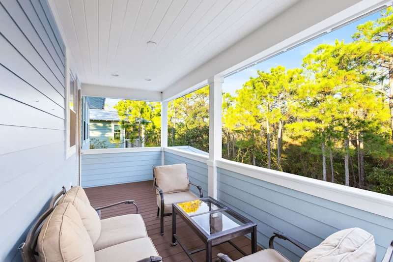 Second floor covered balcony off  back of home.