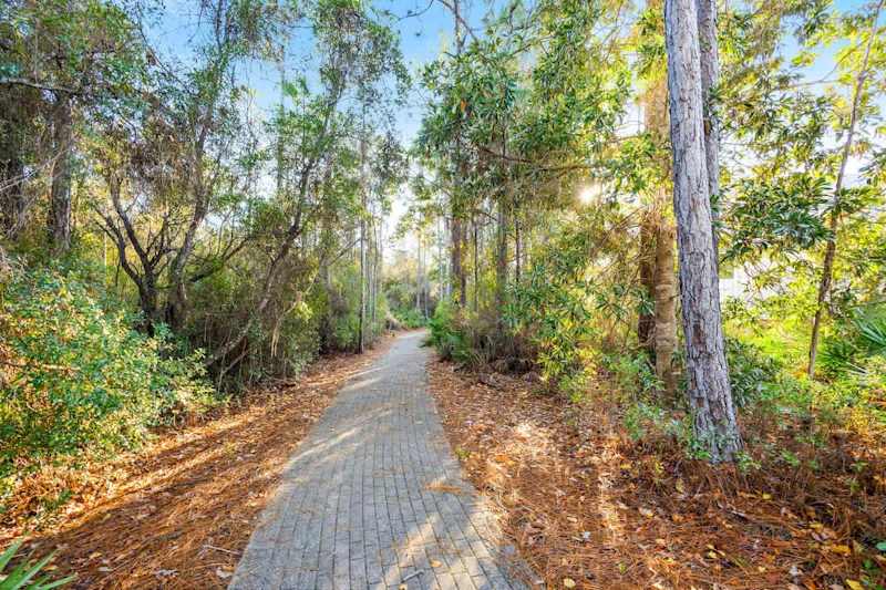 Nature trail right behind the home. Naturewalk Community Trail.