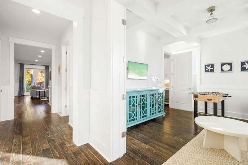 Upon entering the home, you are welcomed by a game room off to the right.