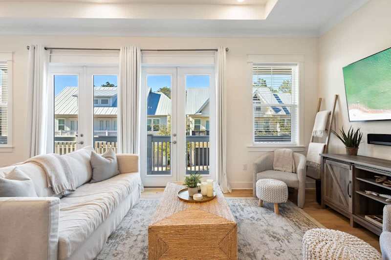 Living room features a queen sleeper sofa.