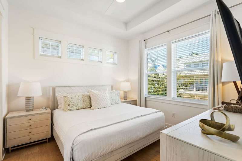 Bedroom #1 features a king bed, ensuite and smart tv.