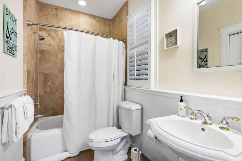 First floor bathroom features a shower/tub combo.