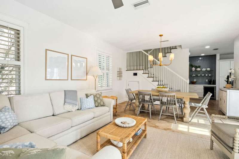 Living room features plenty of seating for all.