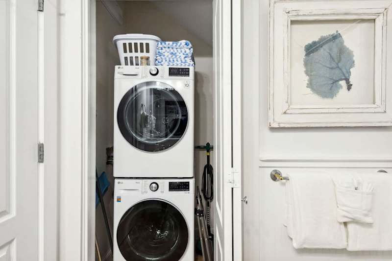 First floor bathroom features a full washer and dryer.