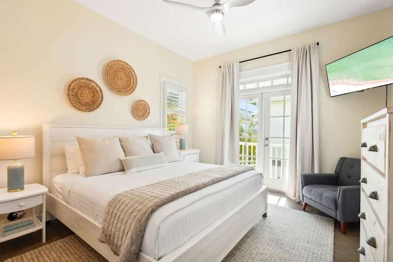 Bedroom #2 features a king bed, ensuite and smart tv.