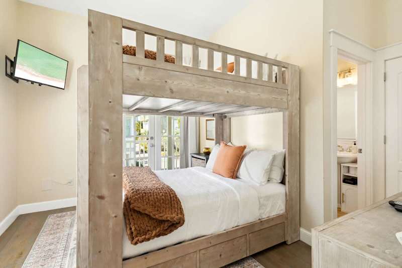 Bedroom #1 features a full over full bunk, ensuite and smart tv.
