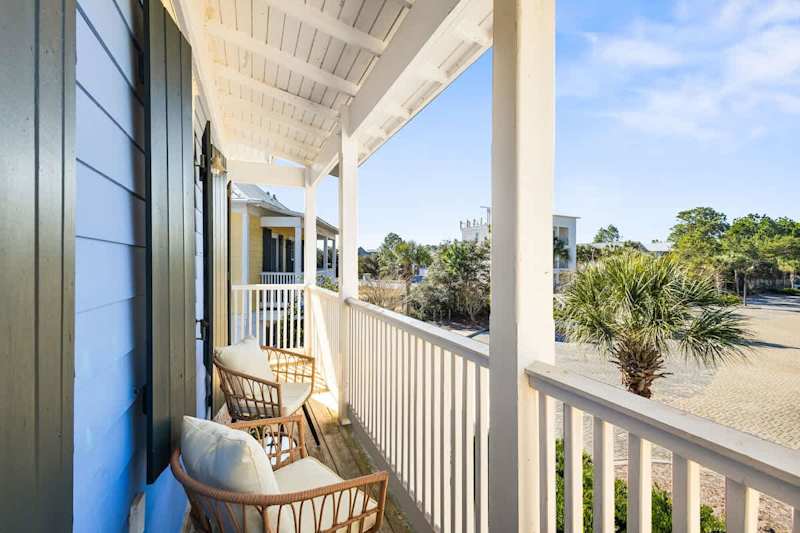 Second floor balcony includes seating making it the perfect spot to enjoy your morning cup of coffee.