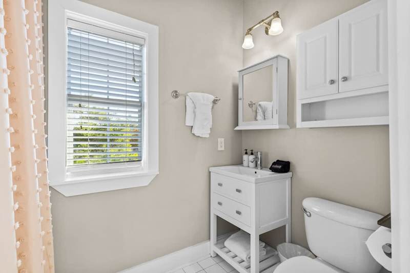 Bathroom features a walk-in shower.