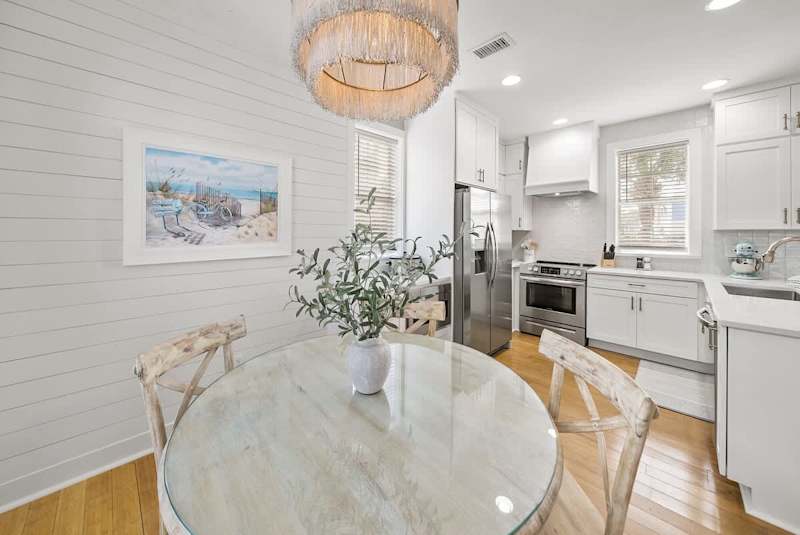 Dining room table features seating for 4.