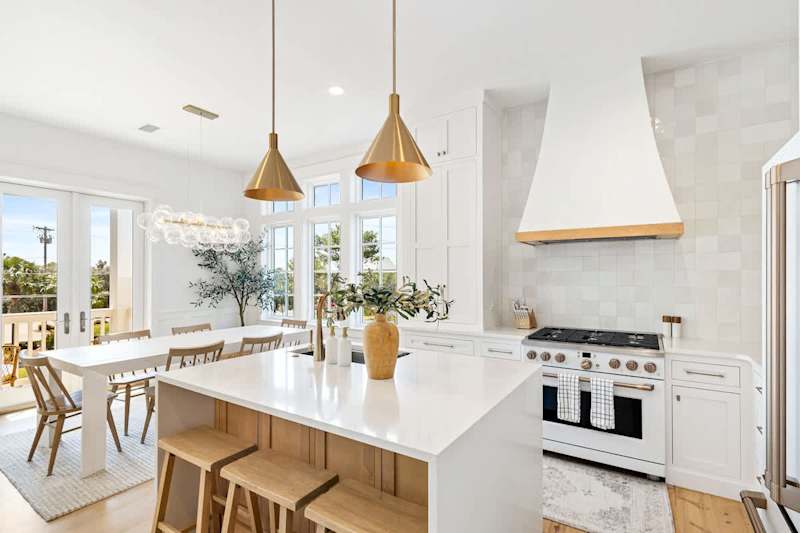 Beautiful gourmet kitchen on second floor is the perfect spot for coming together and cooking as a family.