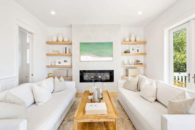 Living area features plenty of seating and a smart tv for unwinding in the evenings.