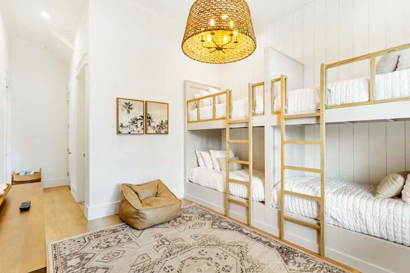 Bedroom #2 features (2) twin over twin built in bunks, a smart tv and ensuite.