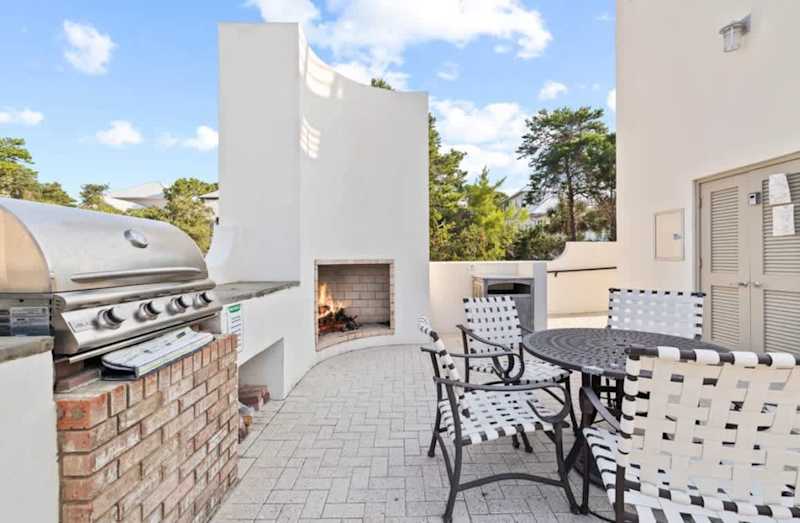 The pool also features a fireplace and bbq grill.