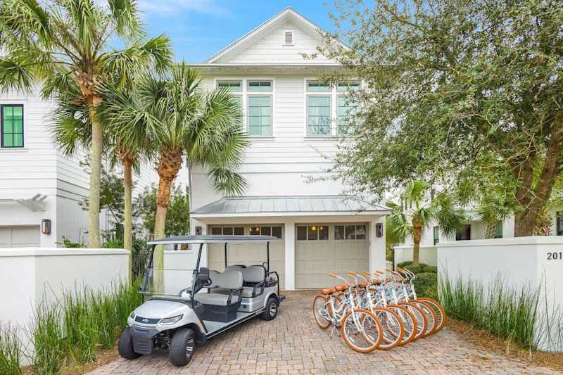 Home features a 6-seater golf cart and 6 adult bikes!