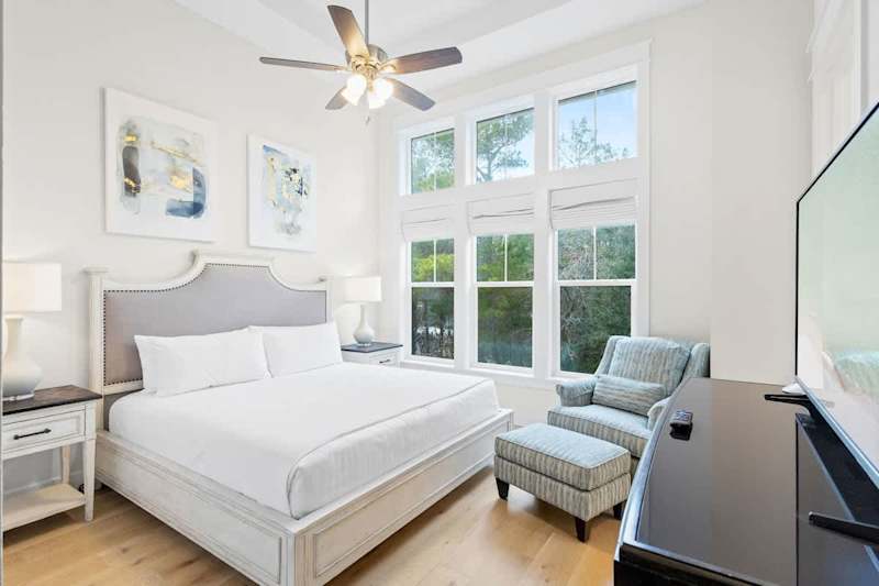 Bedroom #3 features beautiful panoramic windows, a king bed and ensuite!