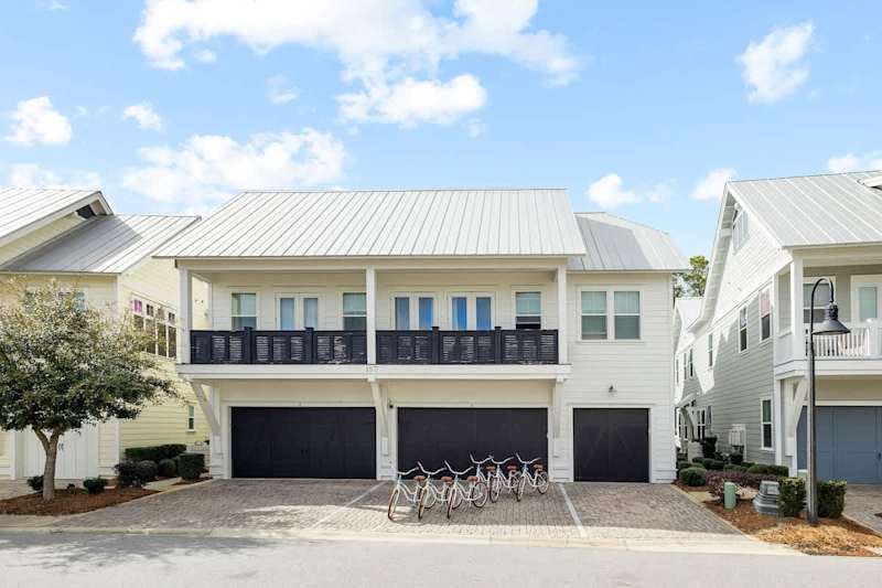 The home is the middle driveway with front entrance to the right. Driveway parking for 2 vehicles.