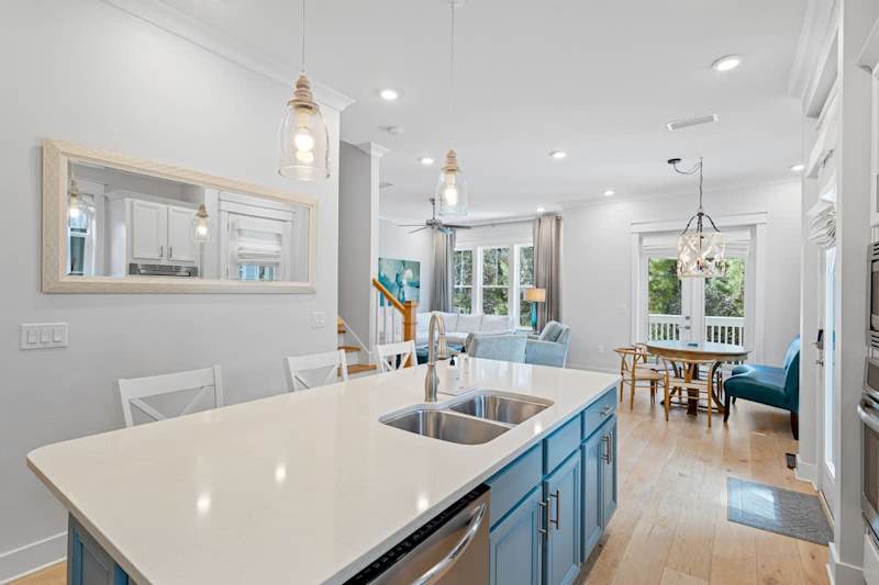Large kitchen island provides seating for an additional 3 people.