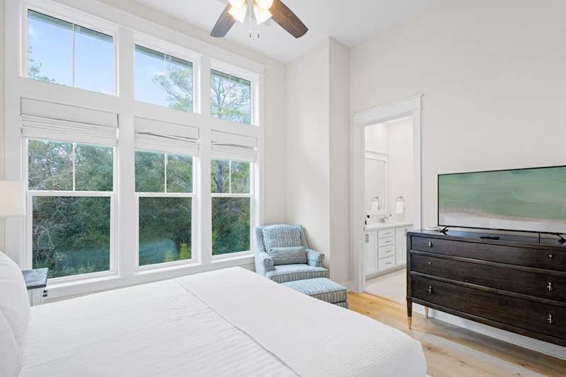 Bedroom also features a smart tv.