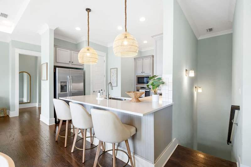 Kitchen island features seating for 3.