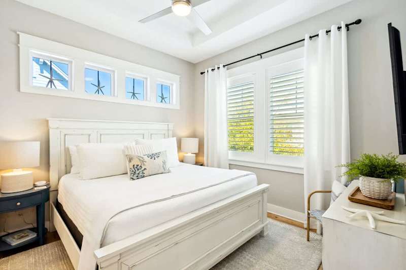 Primary bedroom features a king bed, smart tv and ensuite.
