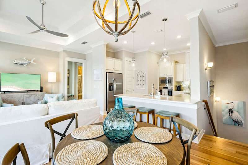 Dining room table includes seating for 4.