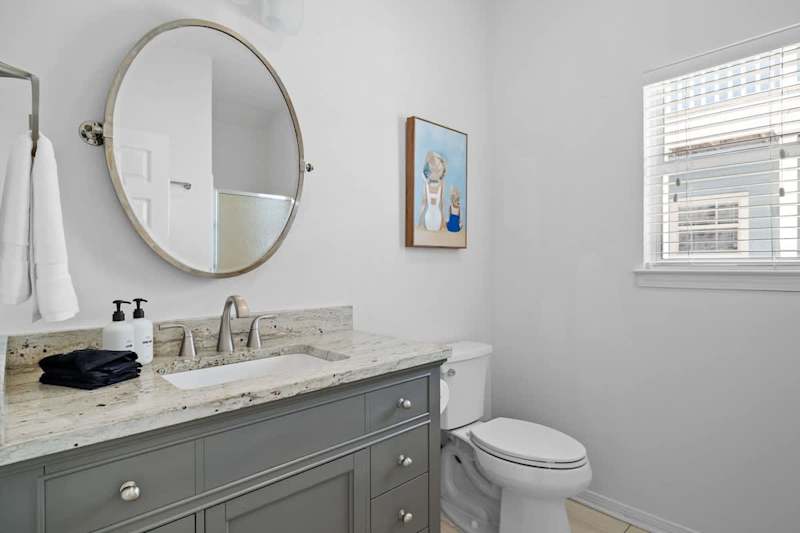 First floor full bath features a walk-in shower.