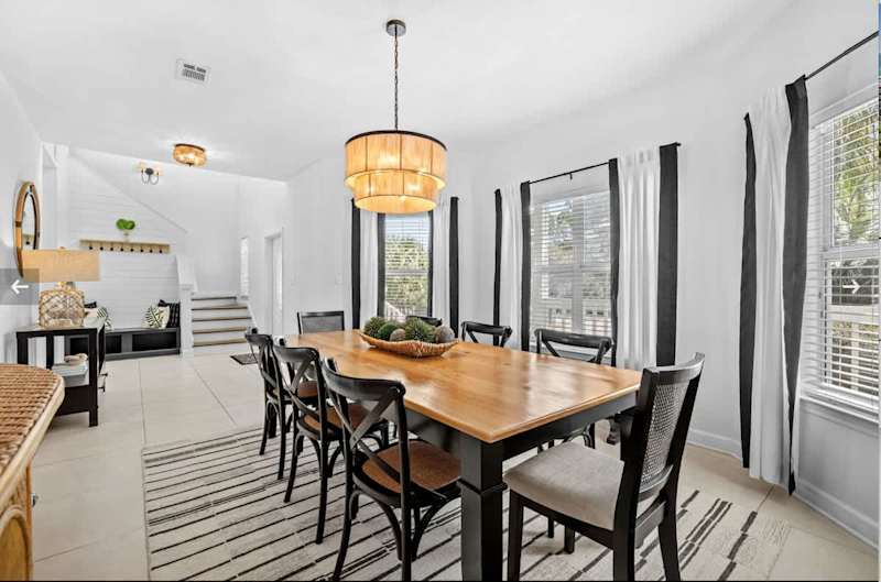 Large dining room table features seating for 8.