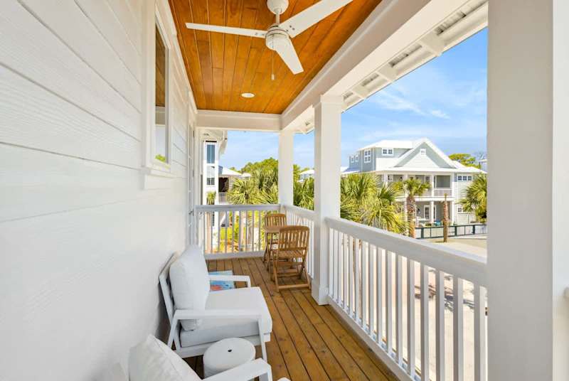 Large covered balcony off bedroom #2 and #3 is the perfect spot to enjoy a morning cup of coffee.