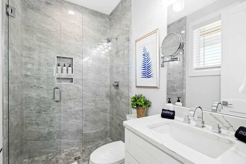 Ensuite bath features a walk-in shower.