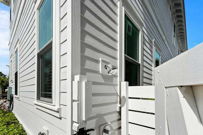 Home has an outdoor shower. Perfect for rinsing off after a day at the beach.