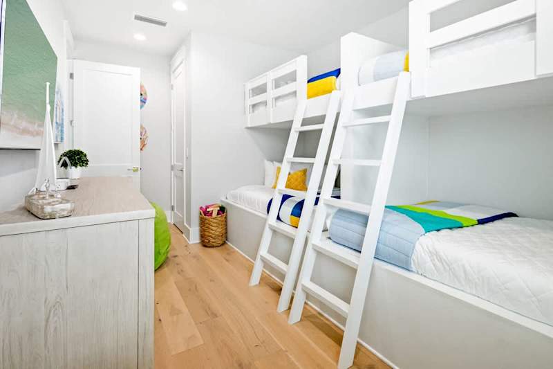 Bedroom #4 features custom built bunk beds. Two twin over full bunks and a smart tv makes this bedroom the prefect spot for the kiddos in the family!