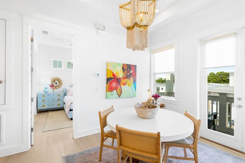 Dining room table includes seating for 4.