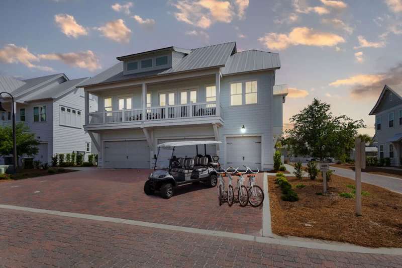 Home includes one driveway parking space in front of the single car garage door.