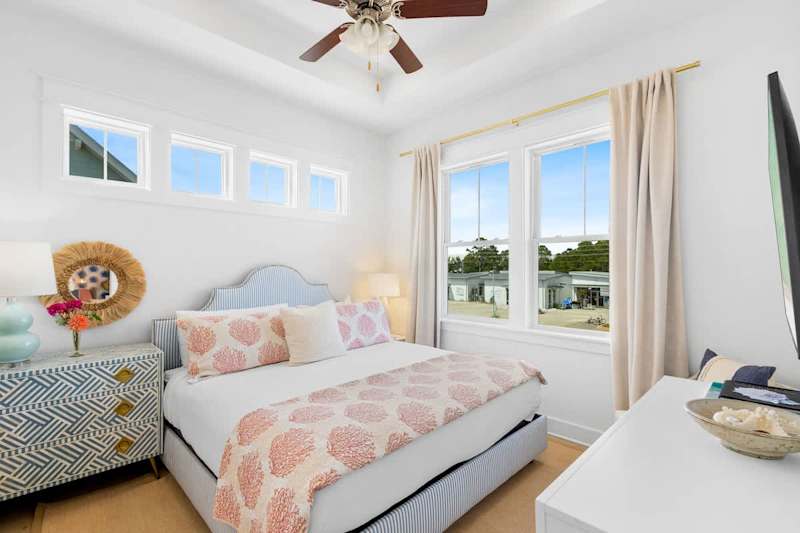 Primary bedroom features a king bed, smart tv and ensuite.