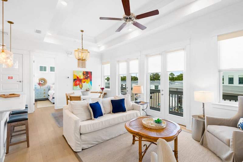 Open concept living area features a queen sleeper sofa.