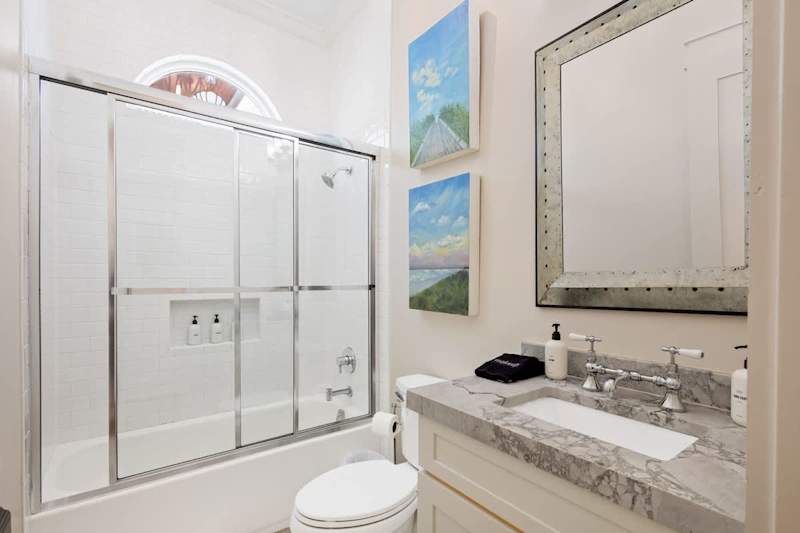 Second floor bathroom features a shower/tub combo.