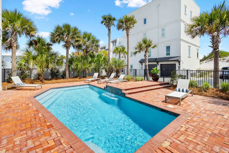 Beautiful outdoor space complete with heated pool and outdoor dining,