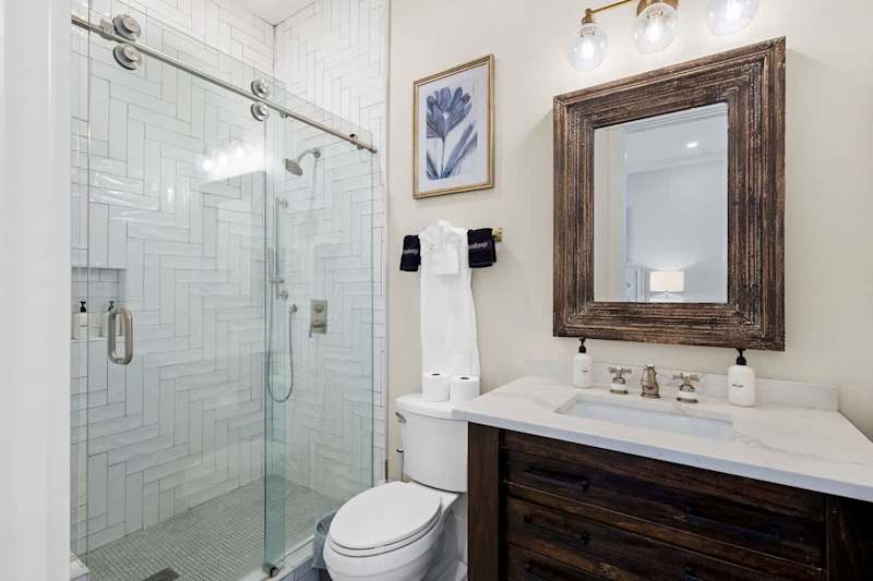 Bathroom includes a walk-in shower.