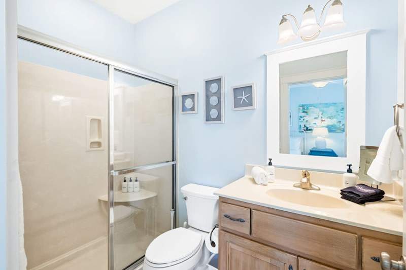 Bathroom features a walk-in shower.