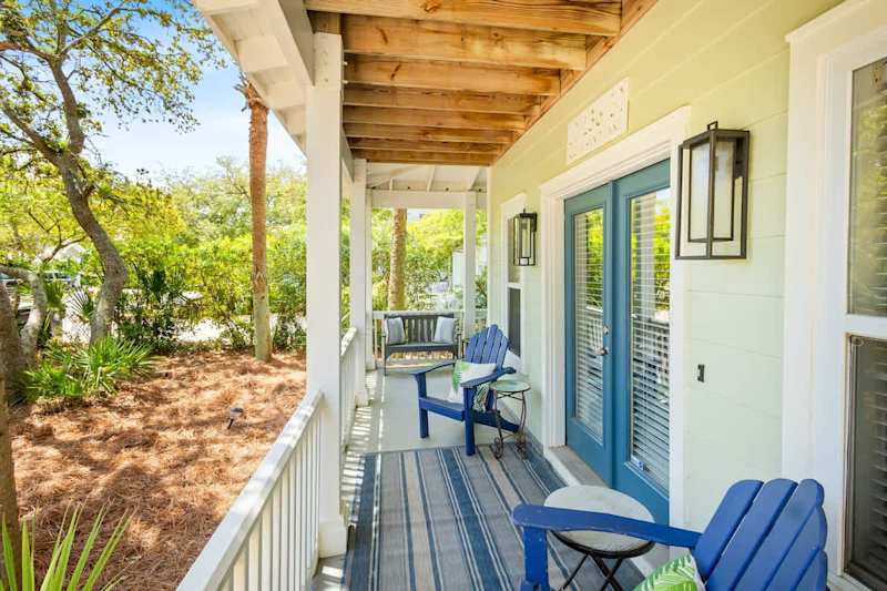 Enjoy your morning cup of coffee on the cozy front porch.
