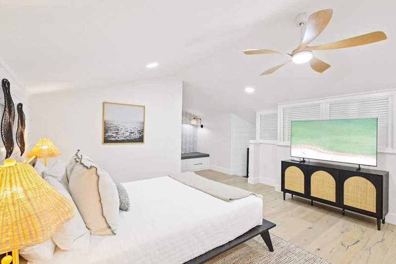 Bedroom includes a smart tv.