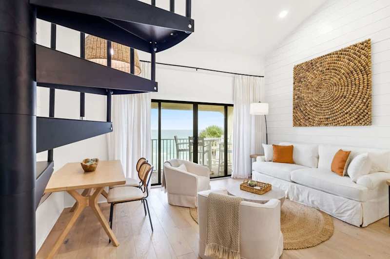 Spiral staircase leads to the third bedroom.