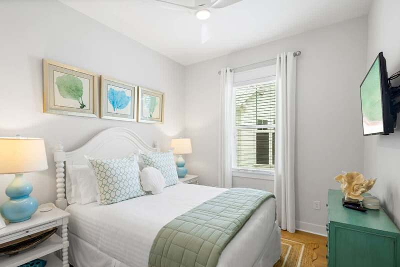 Bedroom #1 features queen bed and a smart tv.