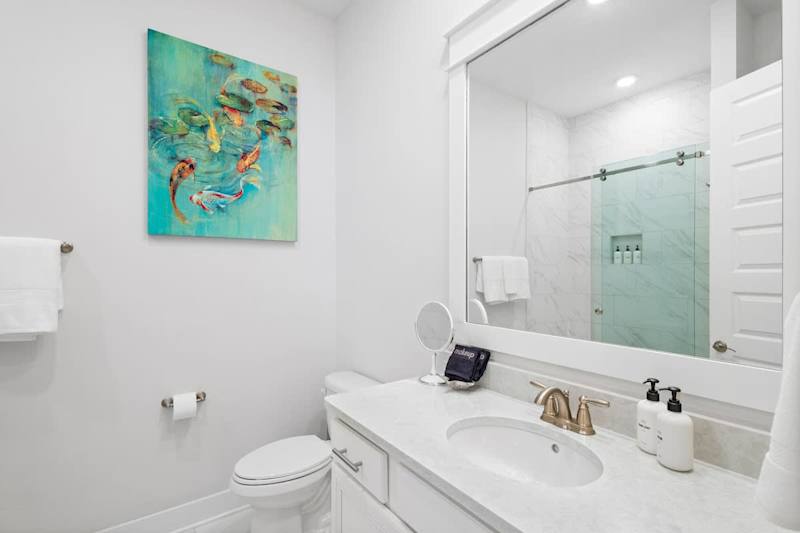 Second floor hall bathroom features a shower/tub combo.