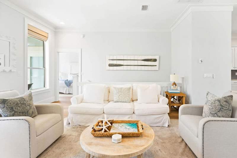 Home features a reverse floor plan, with living, dining, and kitchen on the second floor.